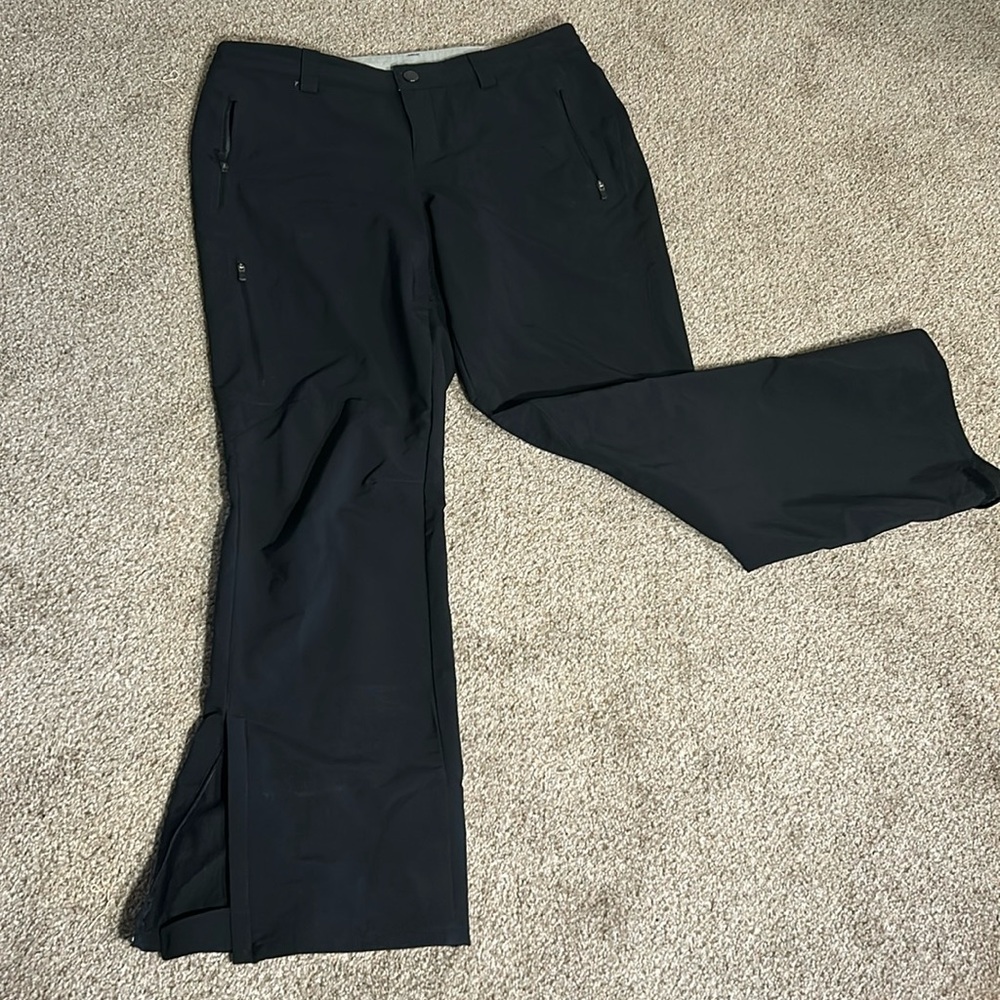 REI water resistant rain pants in size 10 petite.
